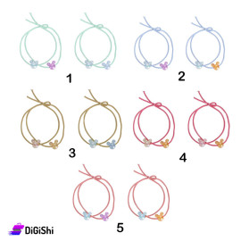 A Pair Of girl's Hair Ties With Mickey Mouse Shape