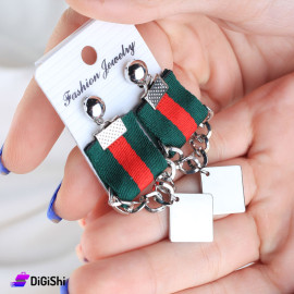A Pair Of Silver Earrings Chains And Squares