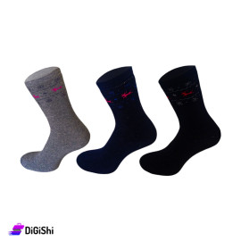 Pair of AlWaseem Women's Medium leg Towel Socks With Patterns on the Ankle