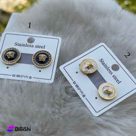 A Pair Of Versace Earrings In Different Colors