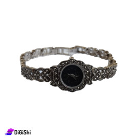 ساعة نسائية فضية مع كستك مزخرف