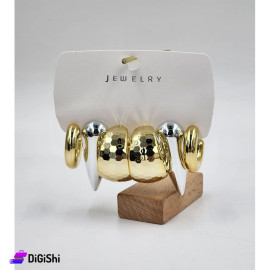 A Set of 3 Pairs of Golden and Silver Earrings in Different Shaped Loops