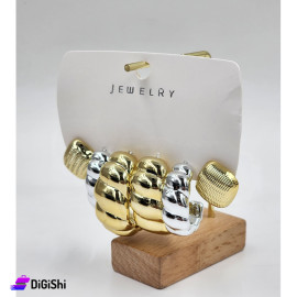 A Set of 3 Pairs of Golden and Silver Earrings in Spiral Shaped Loops