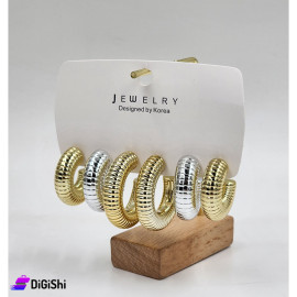 A Set of 3 Pairs of Golden and Silver Earrings in Different Shaped Notched Rings