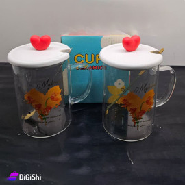 Transparent Cup with Spoon and Wooden Lid and Yellow Heart Drawing