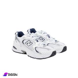 بوط رياضي نسائي قماش مشبك لون أبيض New balance